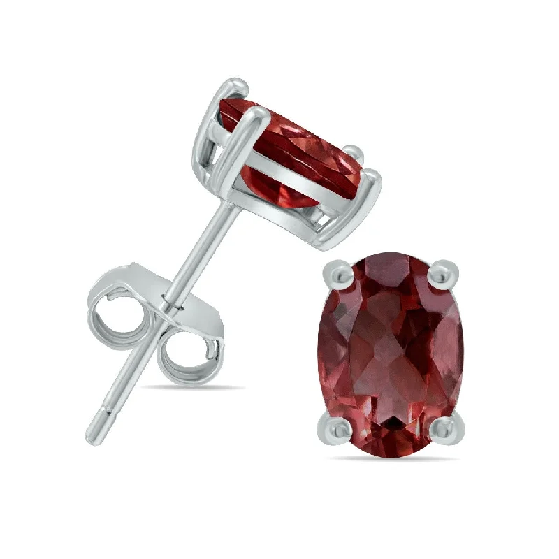 Marquee 5x7MM All Natural Oval Garnet Stud Earrings in .925 Sterling Silver