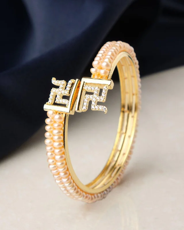 Swastik Stone Studded Pearl Bangle